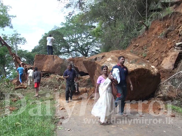 Rocks fall on road