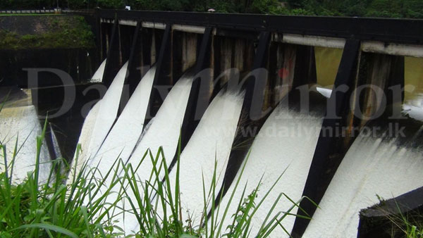 Wimalasurendra sluice gates open