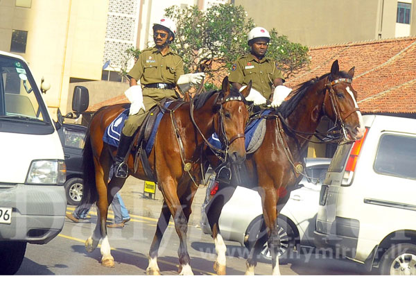 Mounted police on their way back