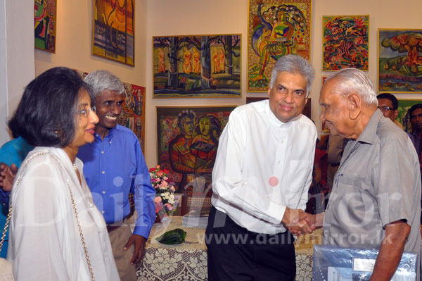 Ranil attends paint exhibition