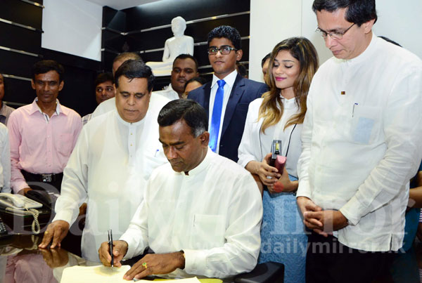 Tissa assumes duties as Health Minister