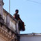 Royal college teacher protests on roof