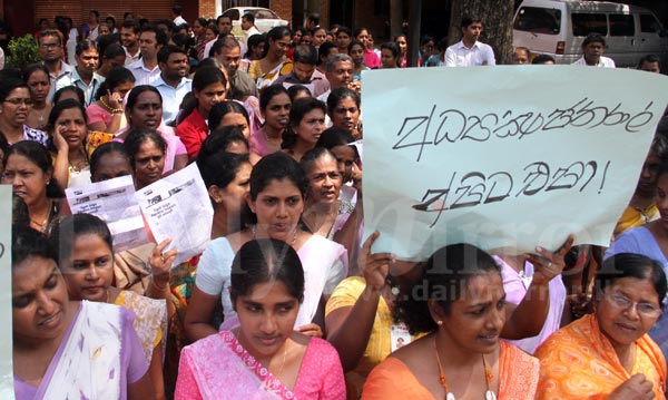 Employees of Department of Pensions protest