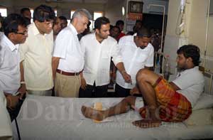 Video: Ranil visits Weliweriya victims in hospital