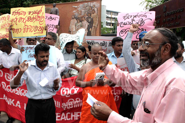 Principals and teachers take to the streets