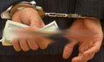 Principal nabbed for soliciting bribe