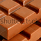 Blade inside slab of chocolate  
