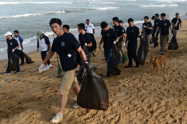 Japanese coastguards cleaning Mt. beach