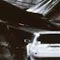 Two vehicles damaged in roof collapse
