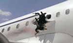  Plane with hole in side makes emergency landing in Somalia