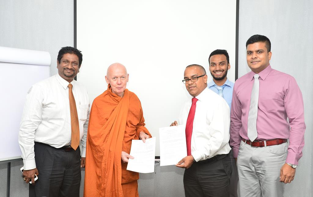 SLASSCOM signs MoU with Dharmavahini Foundation