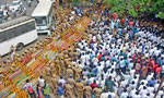 Two attempt self-immolation during demo against SL