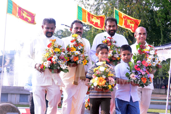 Floral tribute by family members