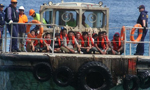 Australia drops people-smuggling charge against Lankan