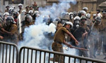 Police fire tear gas at JO protest