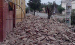 Wall collapse injures 13 students
