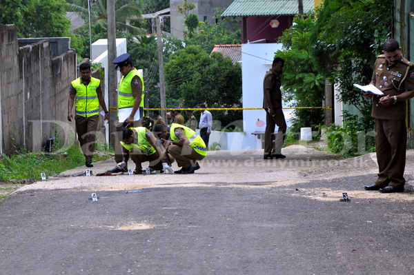 SOCOs examine Thalangama crime scene