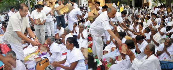 People’s Bank offers Poson Alms Giving (Heel Dāna) to 25,000 devotees observing Sil at Jaya Sri Maha