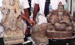 Chinese couple arrested with three antique statues