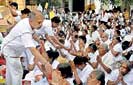 People’s Bank offers alms to 25,000 devotees at Sri Maha Bodhi 