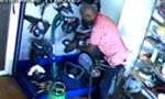 CCTV shows man burgling hardware shop