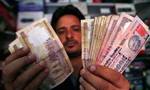 India's neighbours struggle after shock currency move