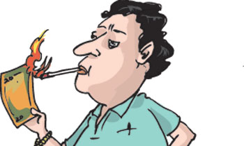 Man lights cigarette with twenty rupee note