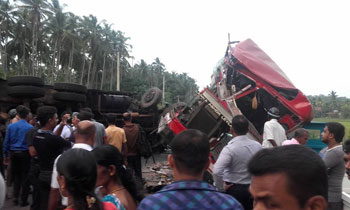 Two killed, 33 injured in head-on collision in Nittambuwa