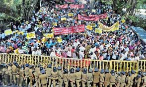 Protest against H’tota port sale