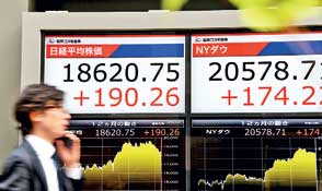 Asian markets chase record Wall St close on hopes for US stimulus