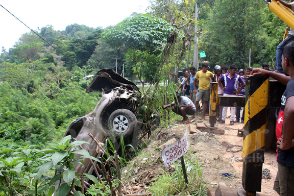 Cab plunges down precipice