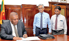 Mangala assumes duties as new FinMin without much fanfare