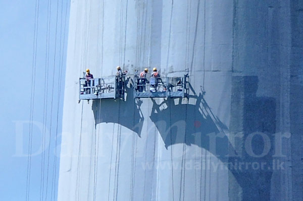 Painting work starts on Lotus Tower