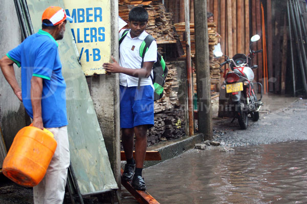 Colombo drenched in showers