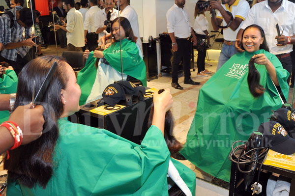 U.S. Sailors donate their hair