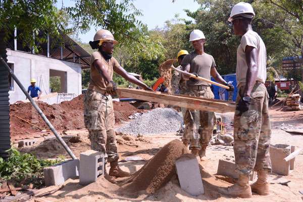 Military personnel of US engage in renovation