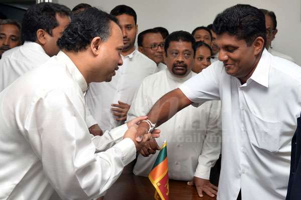 Sajith congratulates Naveen