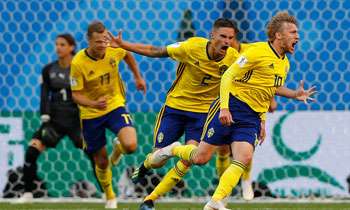 Sweden beat Switzerland to reach quarters