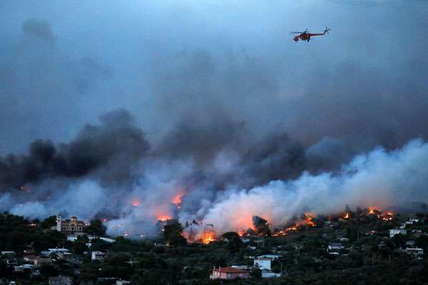 Wildfires kill at least 50 near Athens