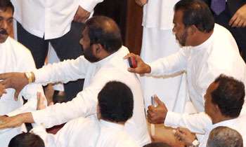 Thewarapperuma brandishes knife in House