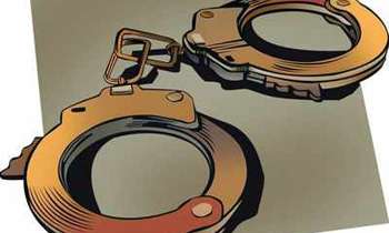 Banners with LTTE chief's pic land duo in jail