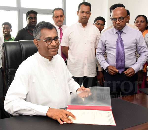 Champika assumes duties