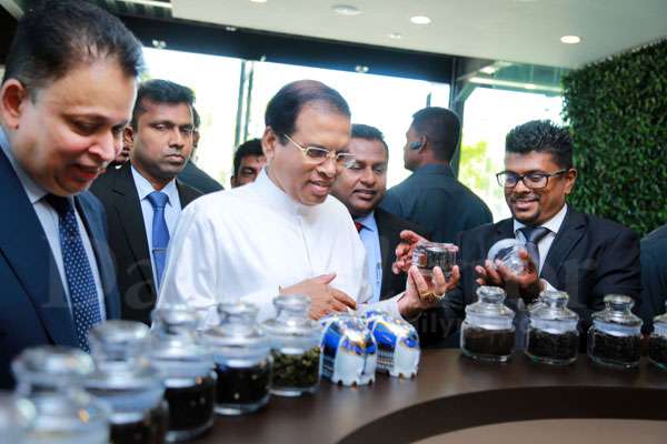 Prez opens modern tea warehousing complex