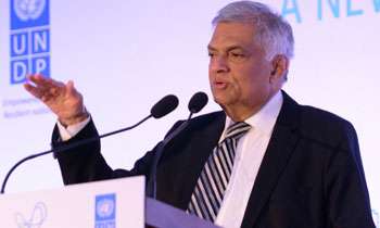 Sri Lanka should re-look at its divisional structure: Ranil