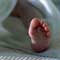 Infant buried alive and rescued