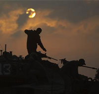 Israel pounds Gaza as rocket fire wanes; talks in Egypt