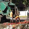 Garbage truck on fire creates traffic jam