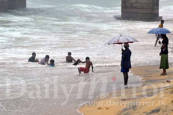 People hit by heavy showers