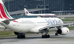 Stranded Lankans return