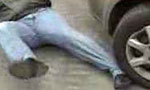 Man sitting on bonnet run over by pickup
